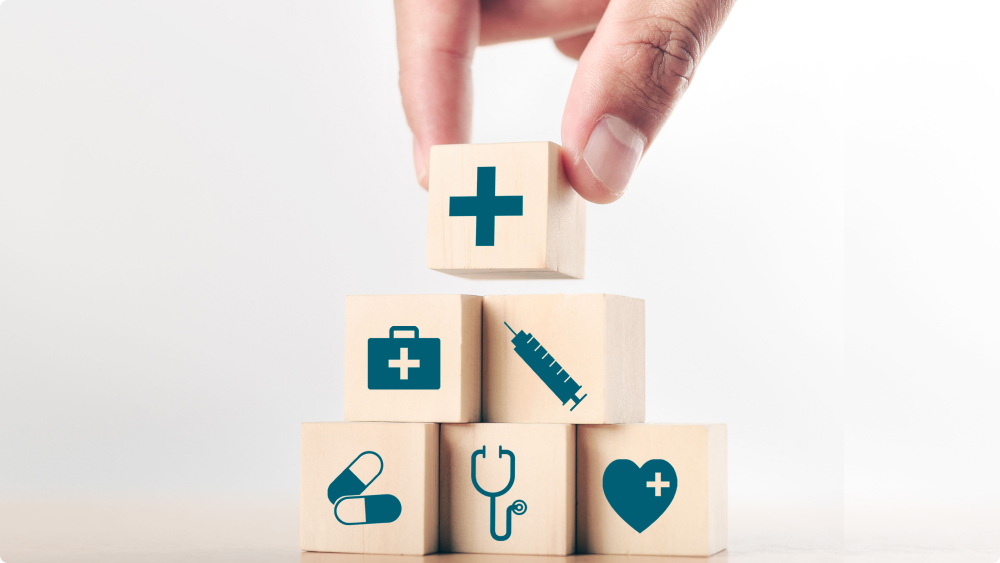 Toy wooden blocks with medical symbols on them